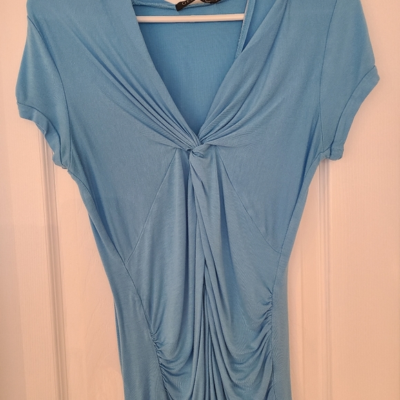 A size small casual shirt. - Picture 2 of 4